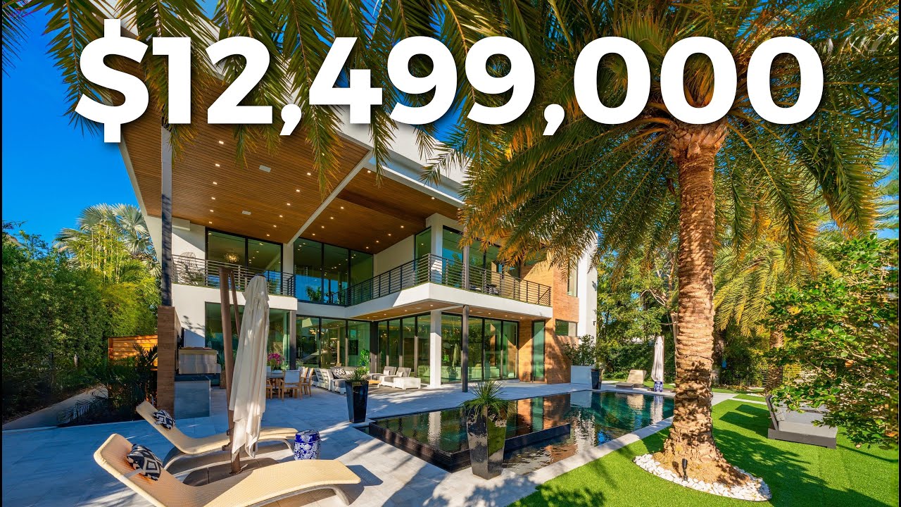 Inside this $12,499,000 Luxury Florida Waterfront Mansion with VIRTUAL GOLF!